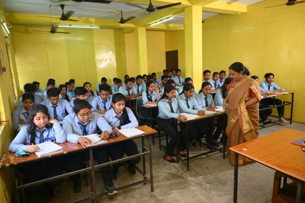 College students in a classroom attending a lecture